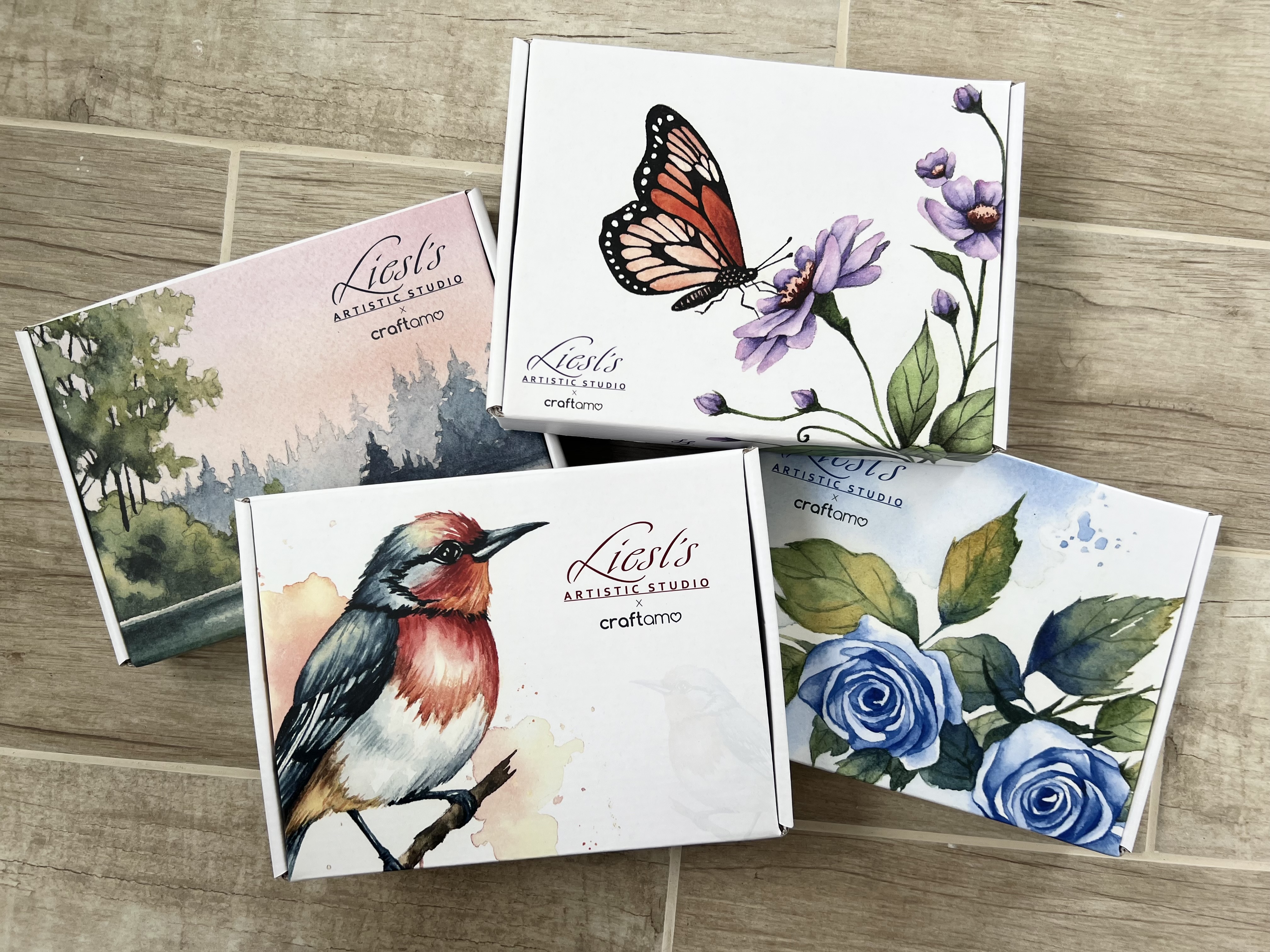 Four themed watercolor subscription boxes